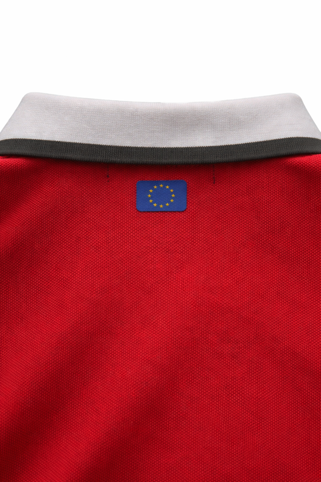 Red polo neck back view featuring a small eu flag logo on a white background
