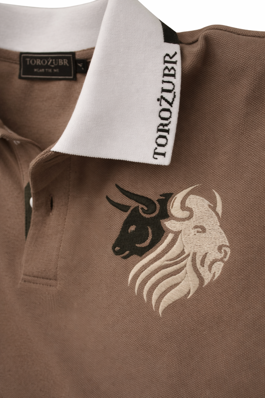 Brown polo shirt with black and white bull logo and 'TOROZUBR' branding. #color_umber